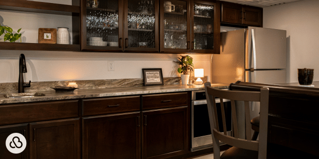 hidden basement remodeling costs in michigan wet bar with glass front cabinets custom built okemos