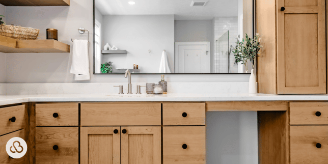 top storage ideas for your bathroom remodel large sink vanity with brown cabinets and framed mirror custom built michigan