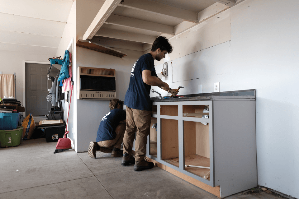 what is a design build firm frequently asked questions remodelers uninstalling basement cabinets custom built michigan