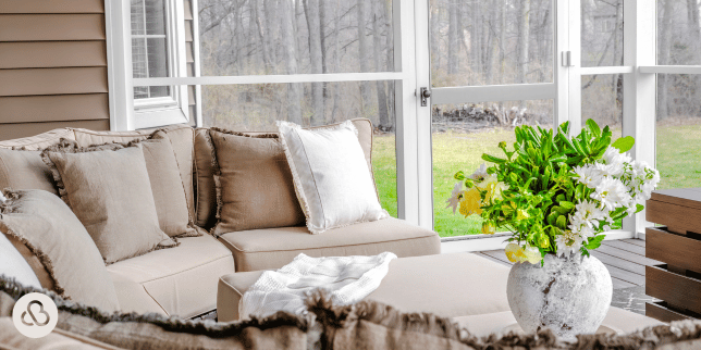 signs its time to build a home addition covered deck with sectional furniture and glass windows custom built michigan