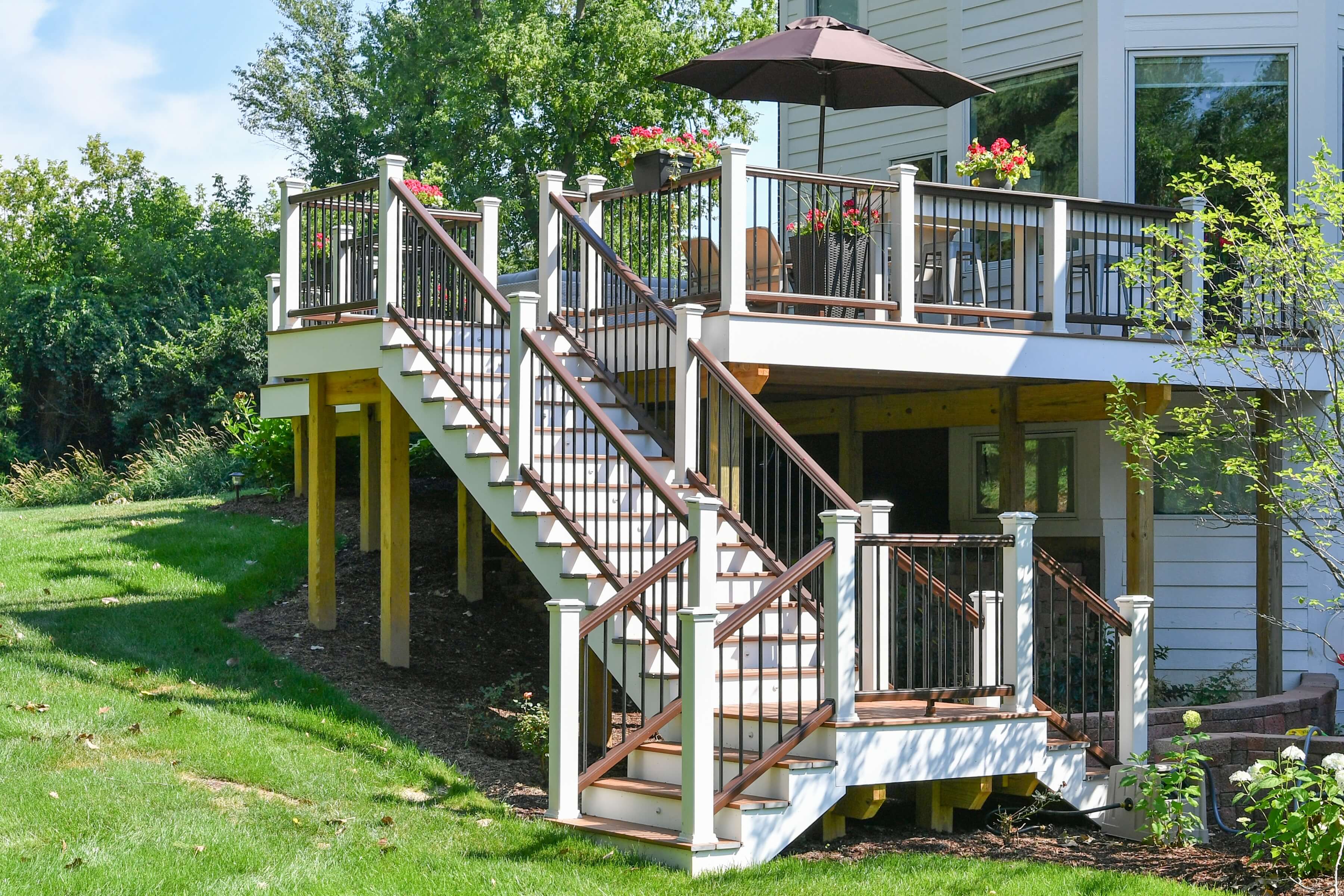 2 story deck with white railing posts