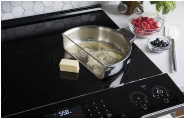 ADA-compliant induction stovetop showing butter being melted