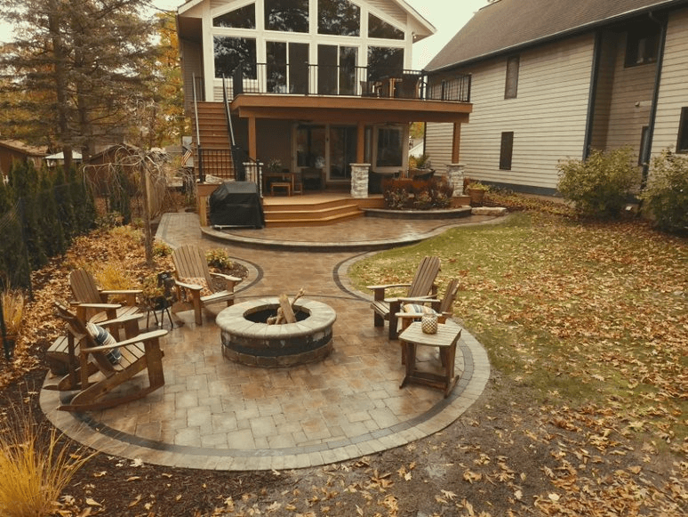 firepit surrounded by brick paver design