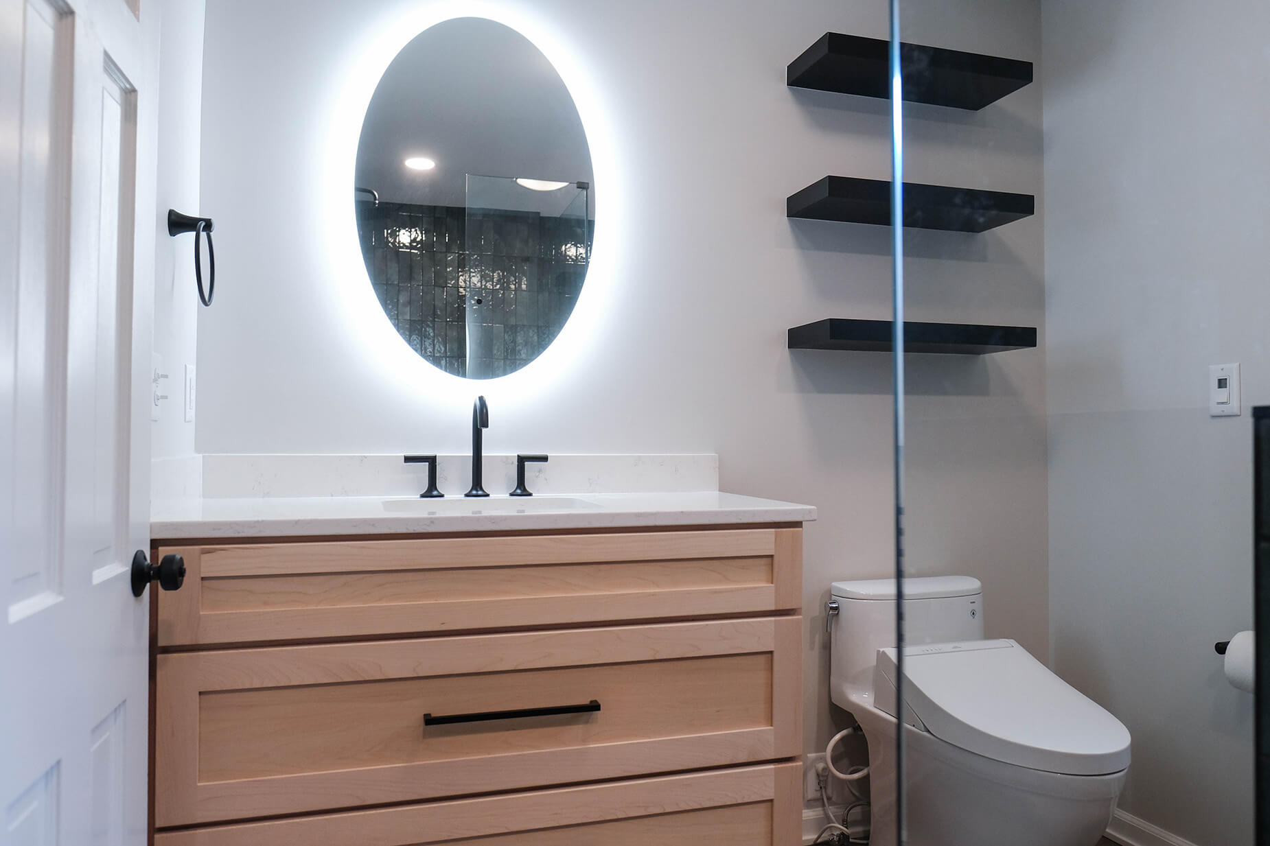 Oval bathroom mirror with backlight