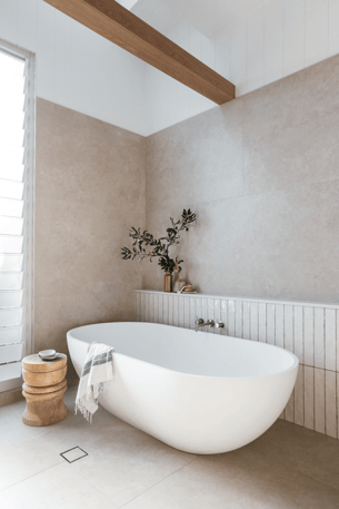 Bathroom with free standing tub and natural, earthy colors