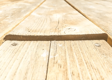 Wooden deck board that is splitting