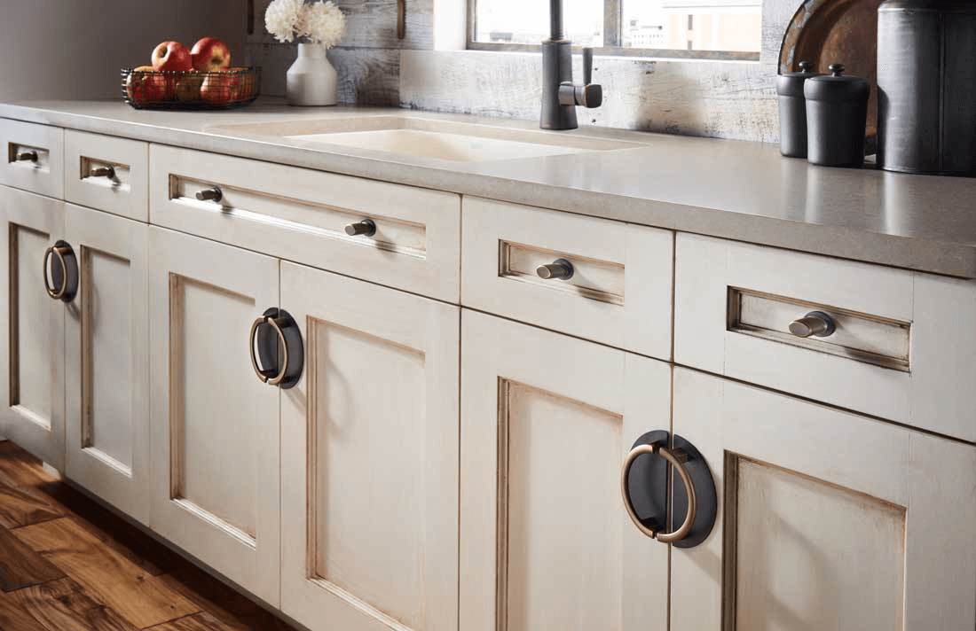 white cabinets with unique handles