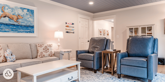 top lighting ideas for your living room remodel sitting area with leather armchairs and coffee table custom built michigan