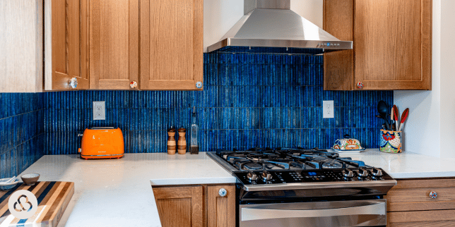 top high end appliances for your kitchen remodel blue tile backsplash with gas range custom built michigan
