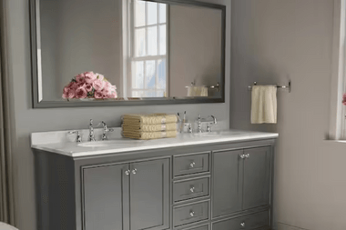 Double sink vanity with dark gray drawers