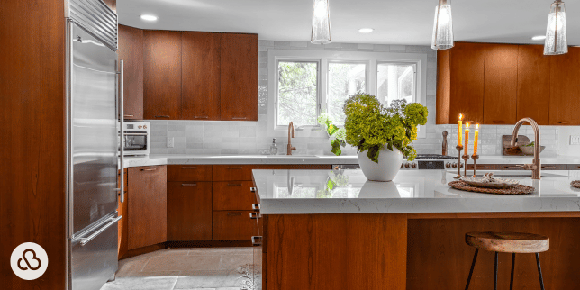 home remodeling trends to expect in 2026 kitchen remodel with refaced cabinets and quartz island custom built michigan