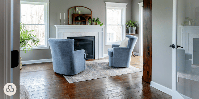 questions to ask home addition contractors in michigan sunroom with armchairs and fireplace custom built okemos
