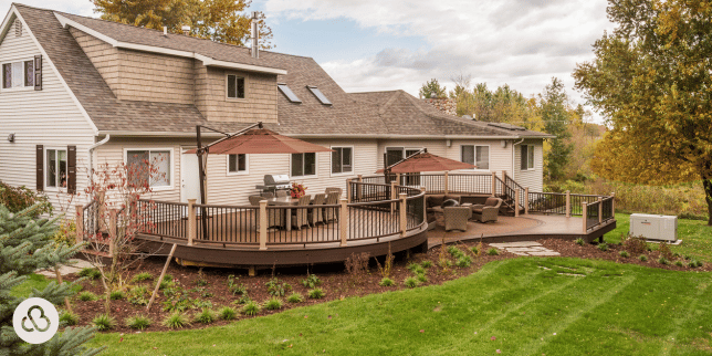 how far in advance should you plan your home remodel composite deck with outdoor umbrellas and dining area custom built michigan