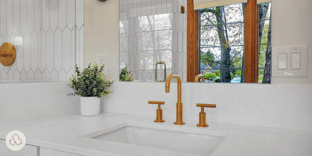 bathroom remodel cost myths every homeowner should know gold finish faucet on quartz sink vanity custom built michigan