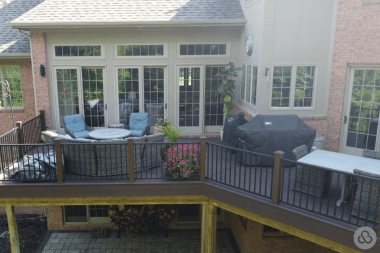 composite deck with outdoor furniture BBQ grill umbrellas custom built