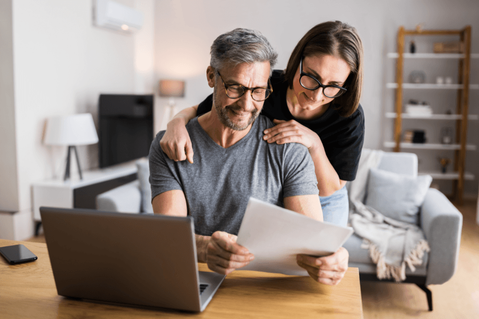common budgeting mistakes to avoid for your home remodel couple planning remodeling project custom built michigan