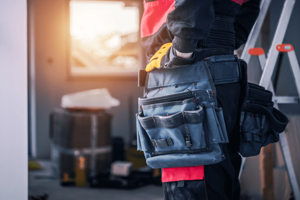 top questions your remodeling contractor should ask you worker with tool belt custom built michigan