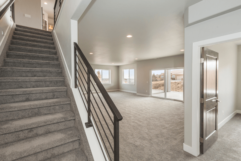 how much can a finished basement add to your homes value stairs and egress windows custom built michigan