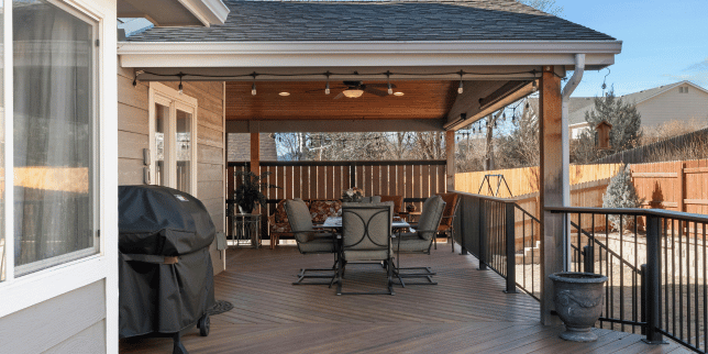 deck remodeling when to refresh vs renovate outdoor living space with dining table custom built michigan