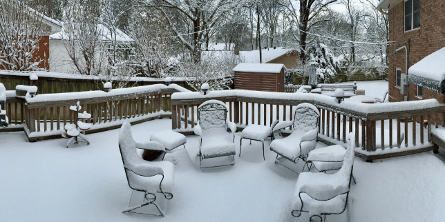 how weather can impact your home remodeling project timeline deck outdoor living space with snow custom built michigan