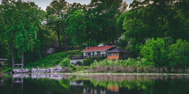 why should remodel your northern michigan vacation rental property lakefront home with trees custom built boyne city