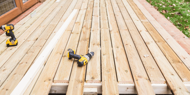 diy deck building vs hiring a contractor wood decking boards with drill custom built michigan