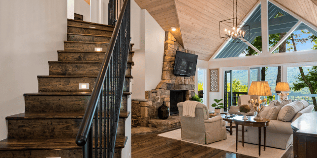 design tips for remodeling your northern michigan vacation rental living room space and stairs custom built michigan