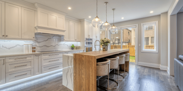 kitchen layout tips for a better flow remodeling space with large waterfall island and backsplash custom built michigan