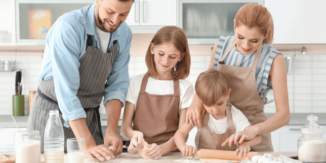 family friendly kitchen remodeling design tips parents and children making breakfast together custom built michigan