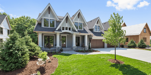 seasonal landscaping tips for year round beauty front yard with fresh lawn and trees custom built michigan