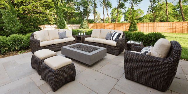 mistakes to avoid while choosing your outdoor furniture fire pit area with wicker sofas and ottomans custom built michigan