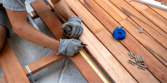 deck replacement vs repair which is right for you builder replacing wood decking boards custom built michigan