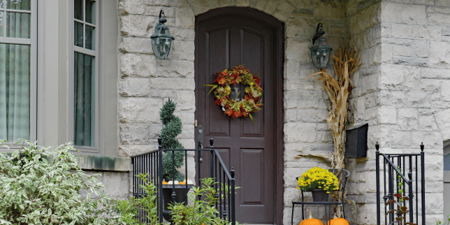 top door replacement ideas for your home remodel front porch with fall inspired wreath and topiary custom built michigan