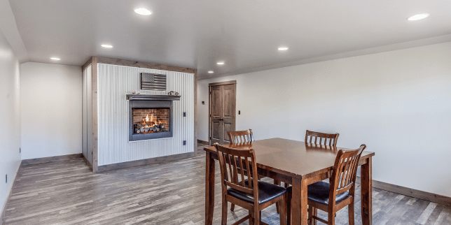 basement lighting ideas for your home remodel dining table in front of fireplace custom built michigan