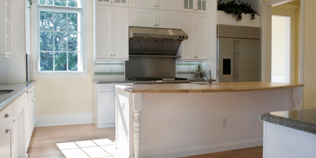 common kitchen layout mistakes homeowners regret later culinary space with tall cabinets and large island custom built michigan