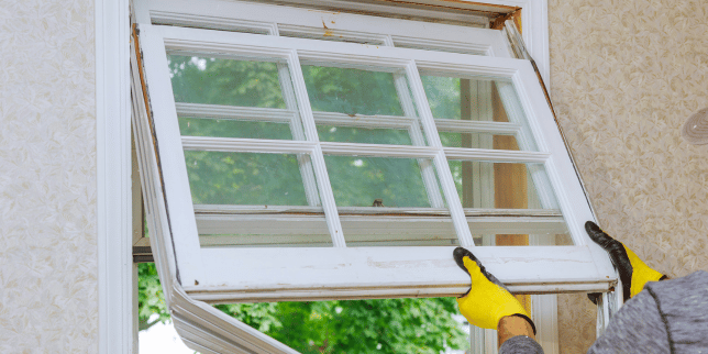 Greater Lansing exterior remodeler replacing window
