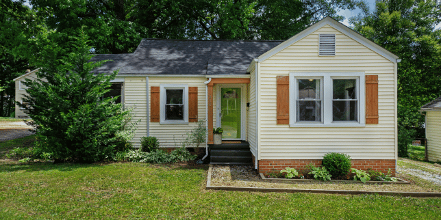 one story home in Greater Lansing Michigan with stone walkway