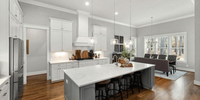 Greater Lansing kitchen remodeling project with white cabinets and large kitchen island