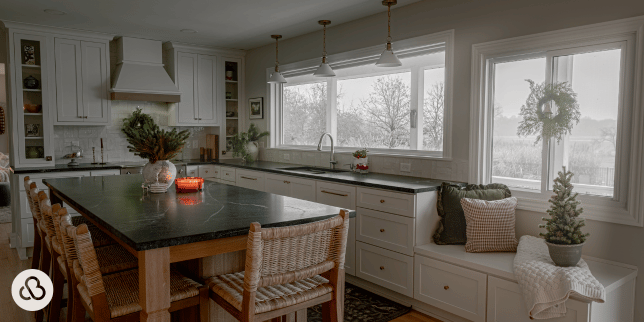 what to expect during a kitchen renovation culinary space with natural stone island and decorative hood custom built michigan