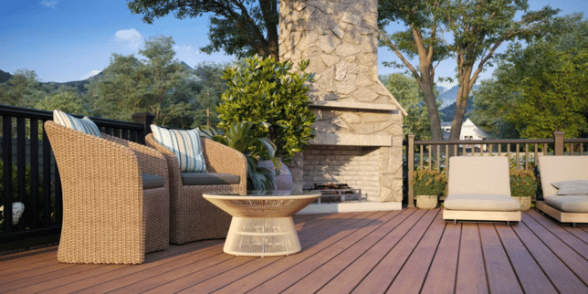 deck replacement in northern michigan what vacation homeowners should know trex composite decking outdoor living space with fireplace custom built boyne city