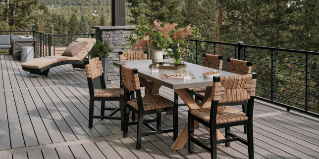 spring composite deck build in Greater Lansing with dining table