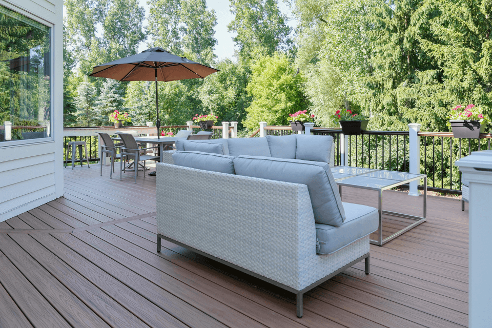 composite deck in lansing michigan with seating and railings cost ranges custom built
