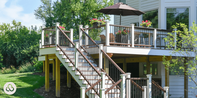 how we build composite decks at custom built multi tier deck with stairs and outdoor living area michigan