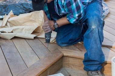 Greater Lansing deck contractor drilling composite decking board