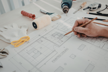 licensed Greater Lansing contractor drawing on project design