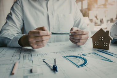 Lansing remodeling contractor reviewing project design documents