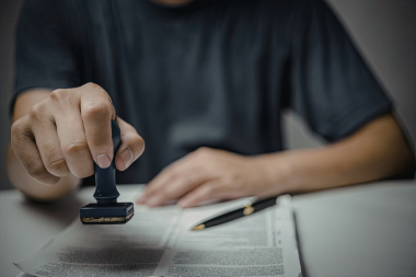 city official stamping permit for kitchen remodel in Greater Lansing