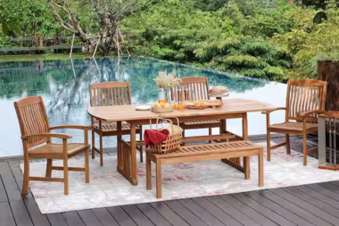 teak outdoor furniture on pool deck in Greater Lansing