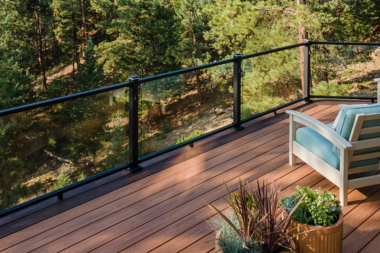 Greater Lansing composite deck with glass panel railings