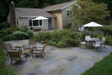 Greater Lansing outdoor living space patio with stone pavers